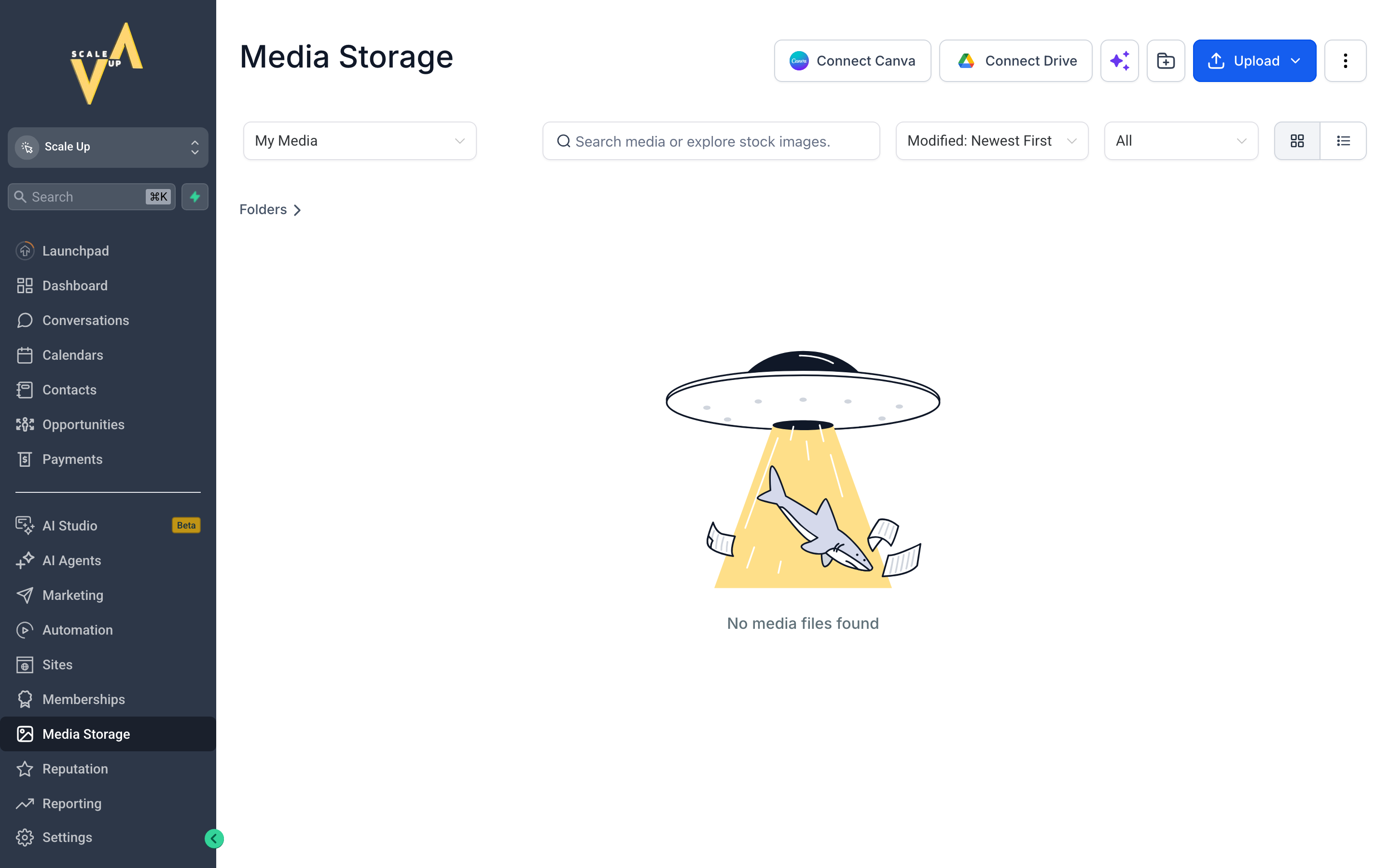 The Media Storage library showing a grid of uploaded images and videos organized into folders, with an upload button and search bar at the top